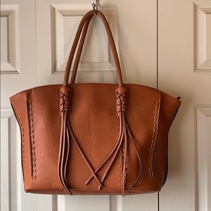 Gussaci large tote style zip close hand bag